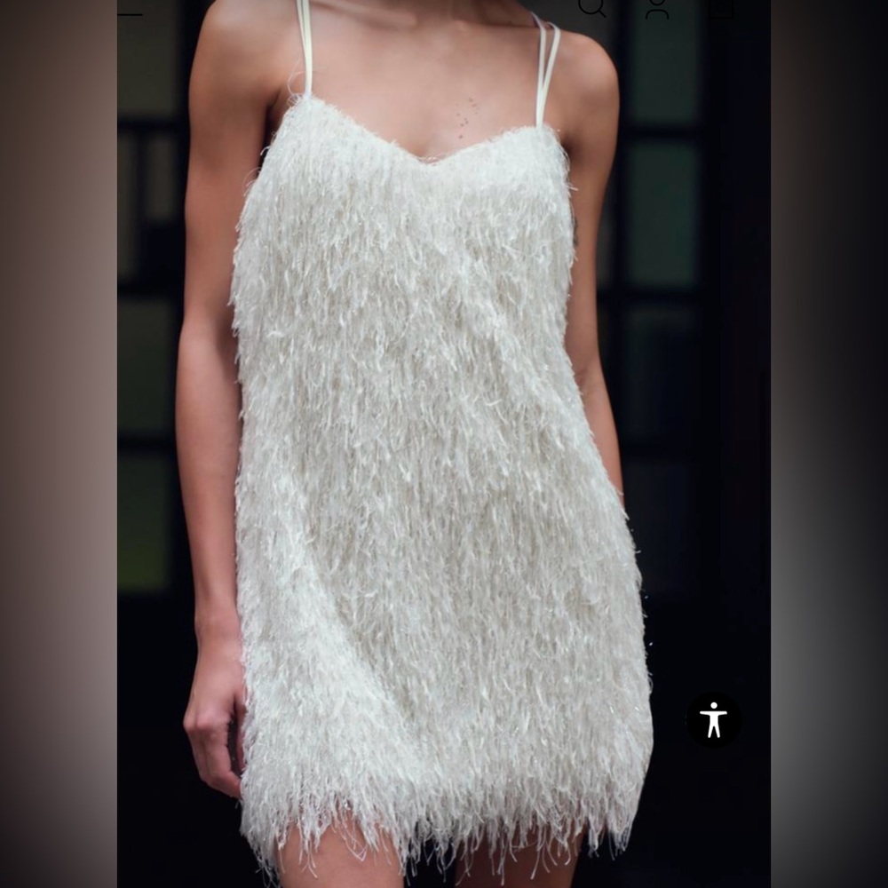 New white creme fringe mini dress